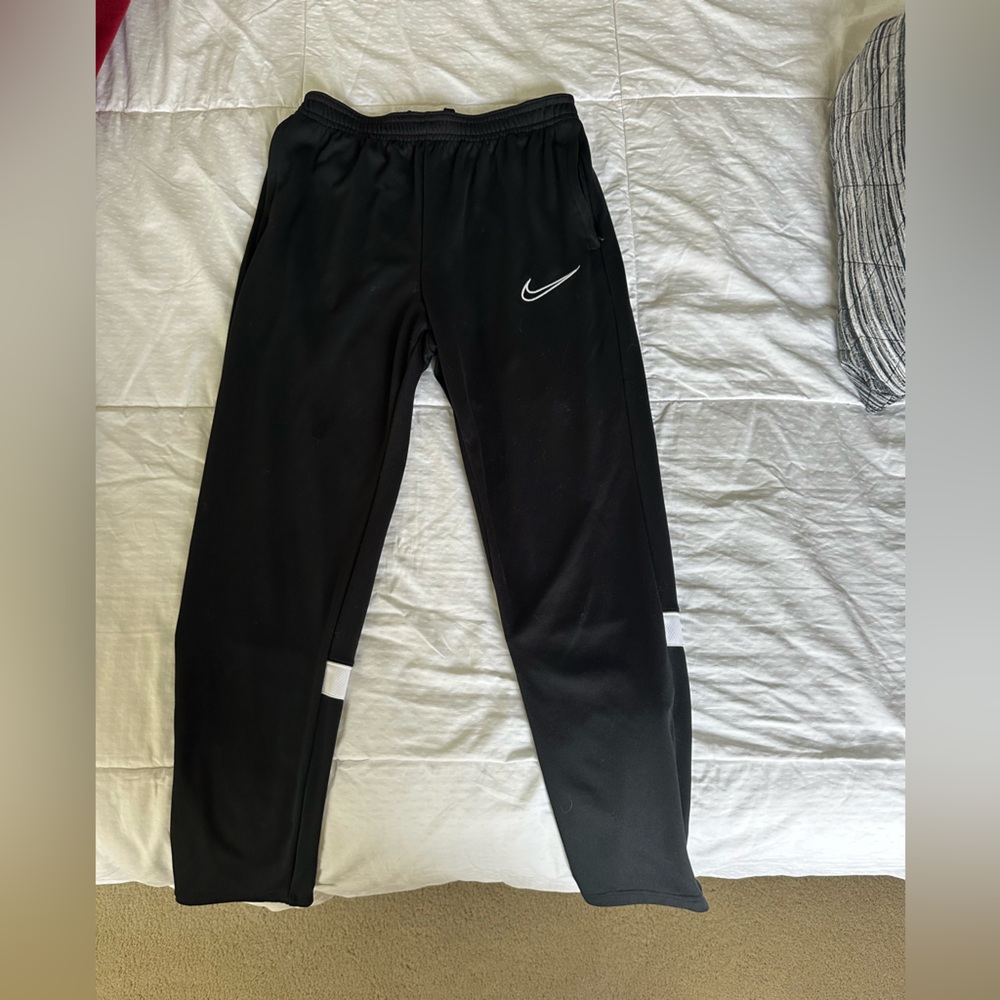 Nike Kids Black warmup pants with White Accents